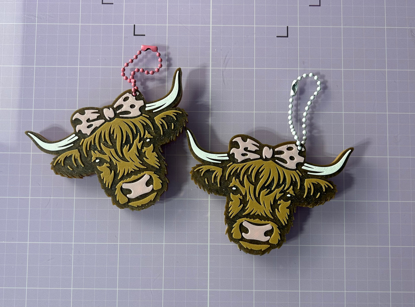 3-D printed Highlander cow can opener keychain
